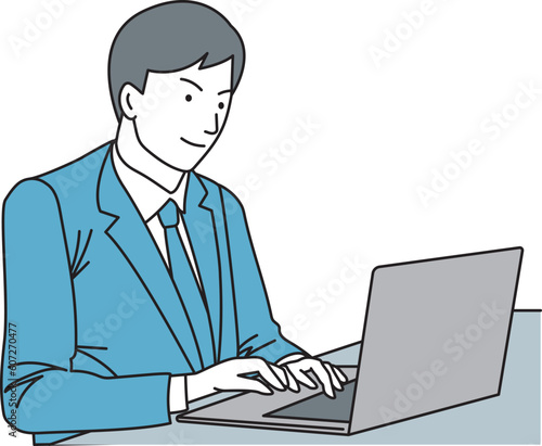 Oriental man in suit using laptop computer
