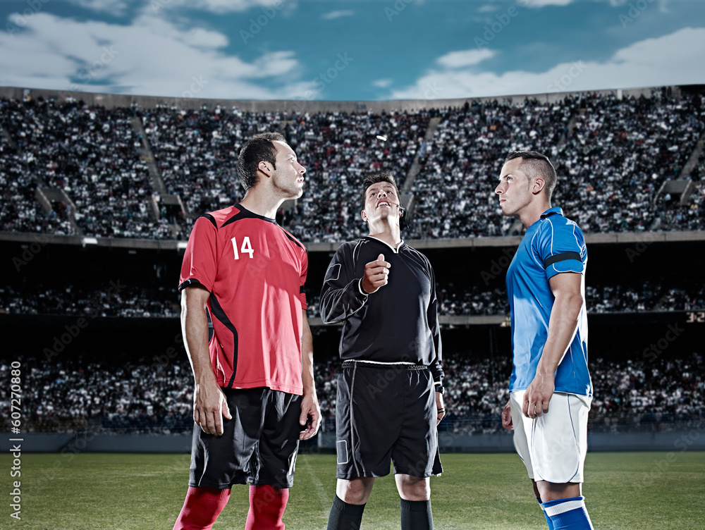 Fototapeta premium Referee tossing coin in soccer game