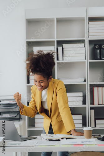 Female smiling colleagues celebrate business win, goal achievement at workplace, giving five, successful teamwork, businesswomen start work with new project, good brainstorm results, victory concept