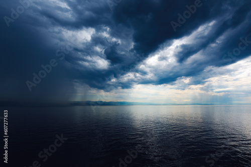Rainy clouds over town of Rijeka in Croatia at the Adriatic sea coast, weather and climate background