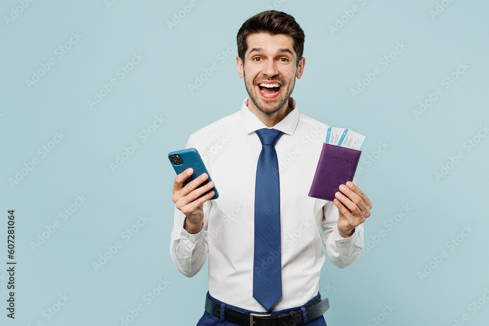 Traveler employee business man corporate lawyer wear shirt tie work in office isolated on plain blue background. Tourist travel abroad in free spare time rest getaway. Air flight trip journey concept. Traveler employee business man corporate lawyer wear shirt tie work in office isolated on plain blue background. Tourist travel abroad in free spare time rest getaway. Air flight trip journey concept.