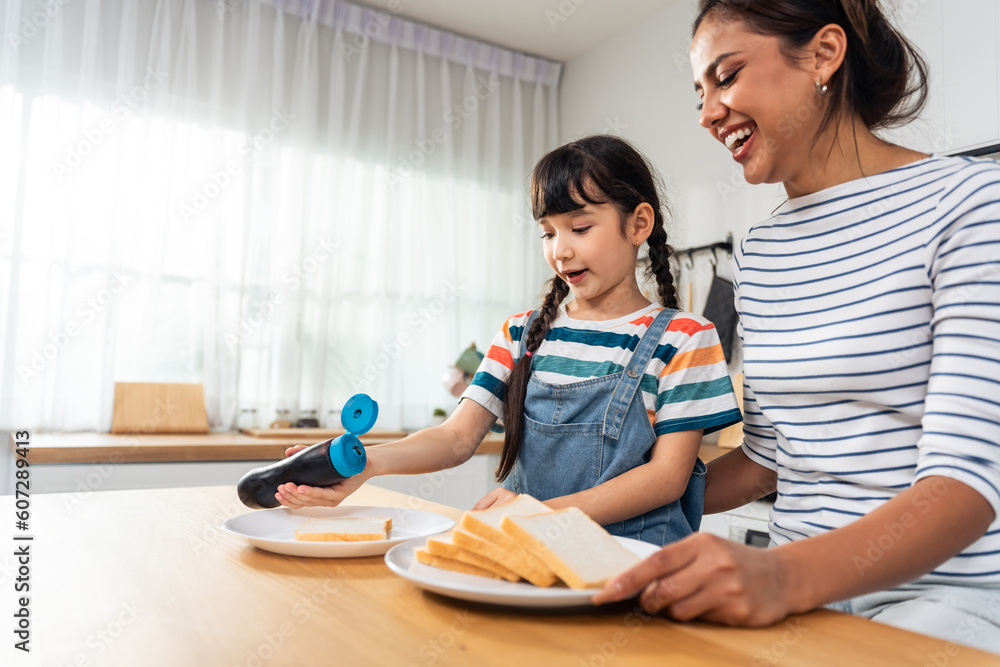 Caucasian happy family, parent spend time with kid together at home. Caucasian happy family, parent spend time with kid together at home.