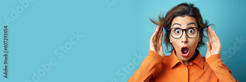 Close up studio photo portrait of humorous terrified astonished person touching head with hands looking at camera isolated studio background. Generative AI