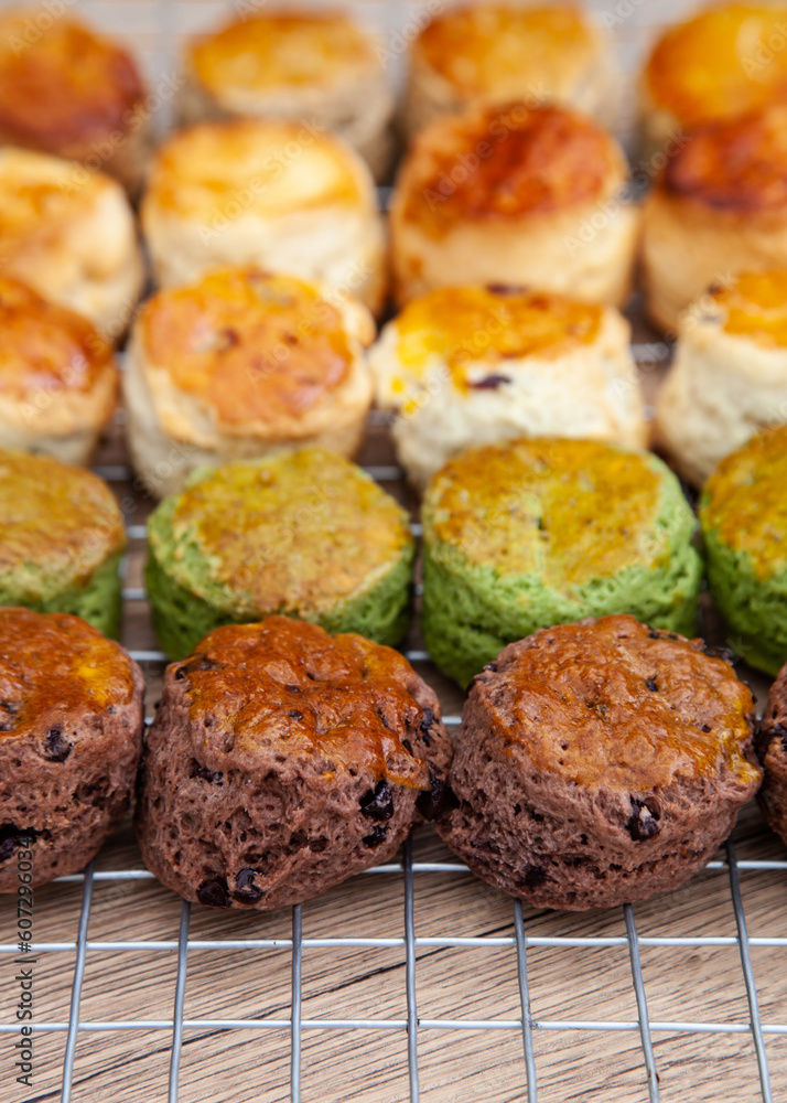 Five flavour of scone, chocolate, butter, cranberry, Earl grey, Matcha, served with clotted cream and raspberry jam. Five flavour of scone, chocolate, butter, cranberry, Earl grey, Matcha, served with clotted cream and raspberry jam.