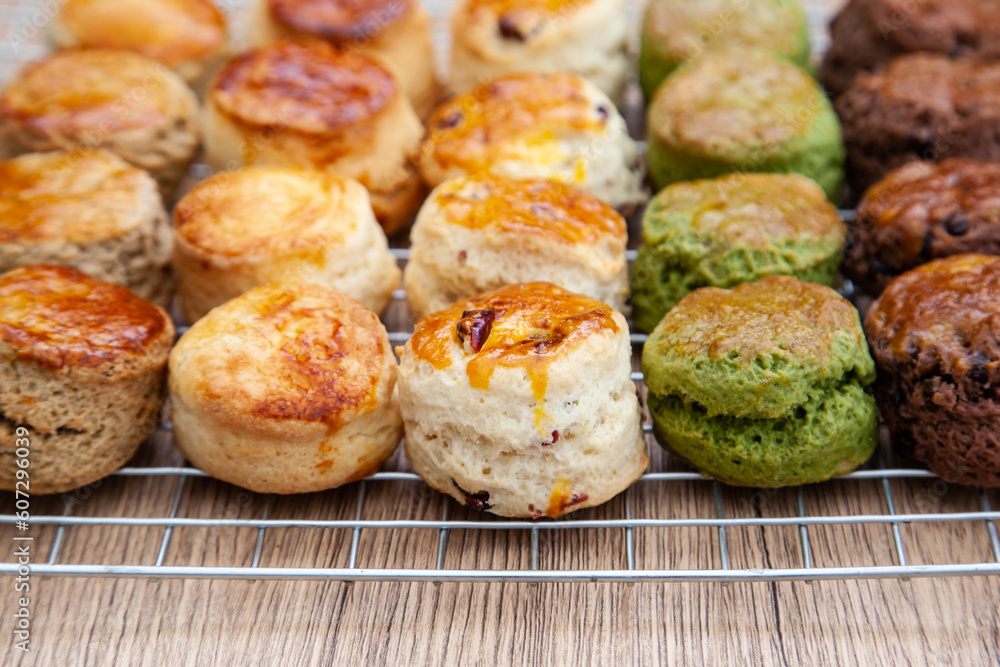 Five flavour of scone, chocolate, butter, cranberry, Earl grey, Matcha, served with clotted cream and raspberry jam. Five flavour of scone, chocolate, butter, cranberry, Earl grey, Matcha, served with clotted cream and raspberry jam.