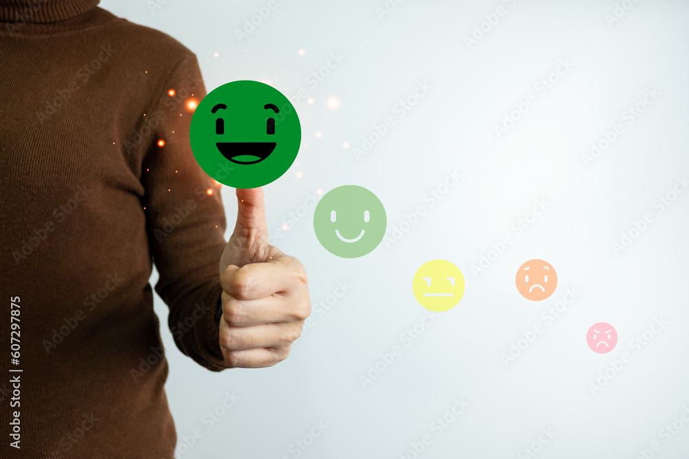 Customer satisfaction concept, client is satisfied with pressing the smiley face icon, excellent service, impressed with care, highest rating and score, good feedback from users. Customer satisfaction concept, client is satisfied with pressing the smiley face icon, excellent service, impressed with care, highest rating and score, good feedback from users.