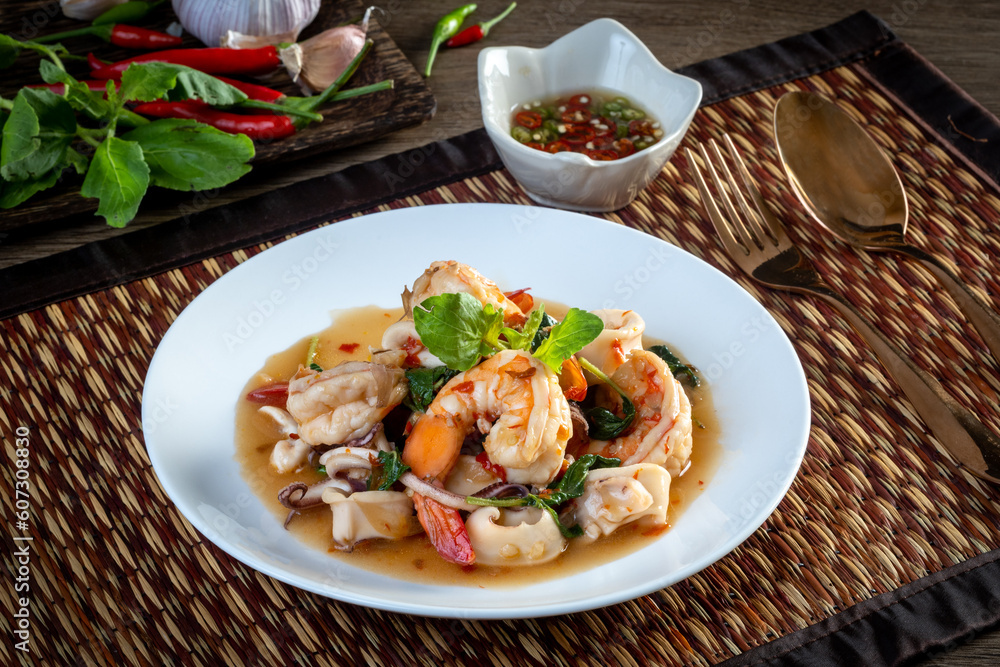 Stir Fried Basil with Seafood on the table Stir Fried Basil with Seafood on the table
