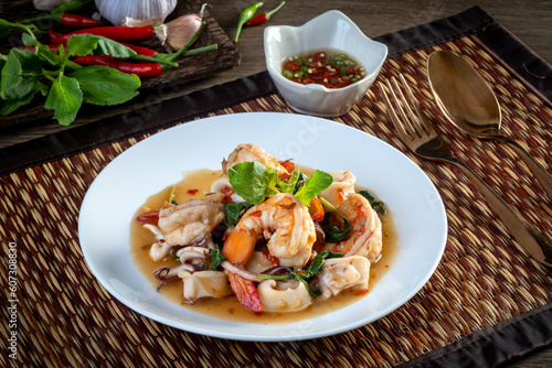 Stir Fried Basil with Seafood on the table