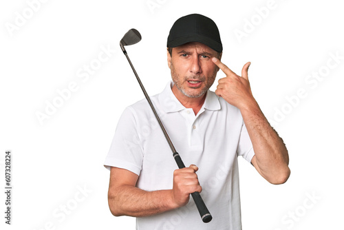 Middle aged golfer man confused, feels doubtful and unsure.