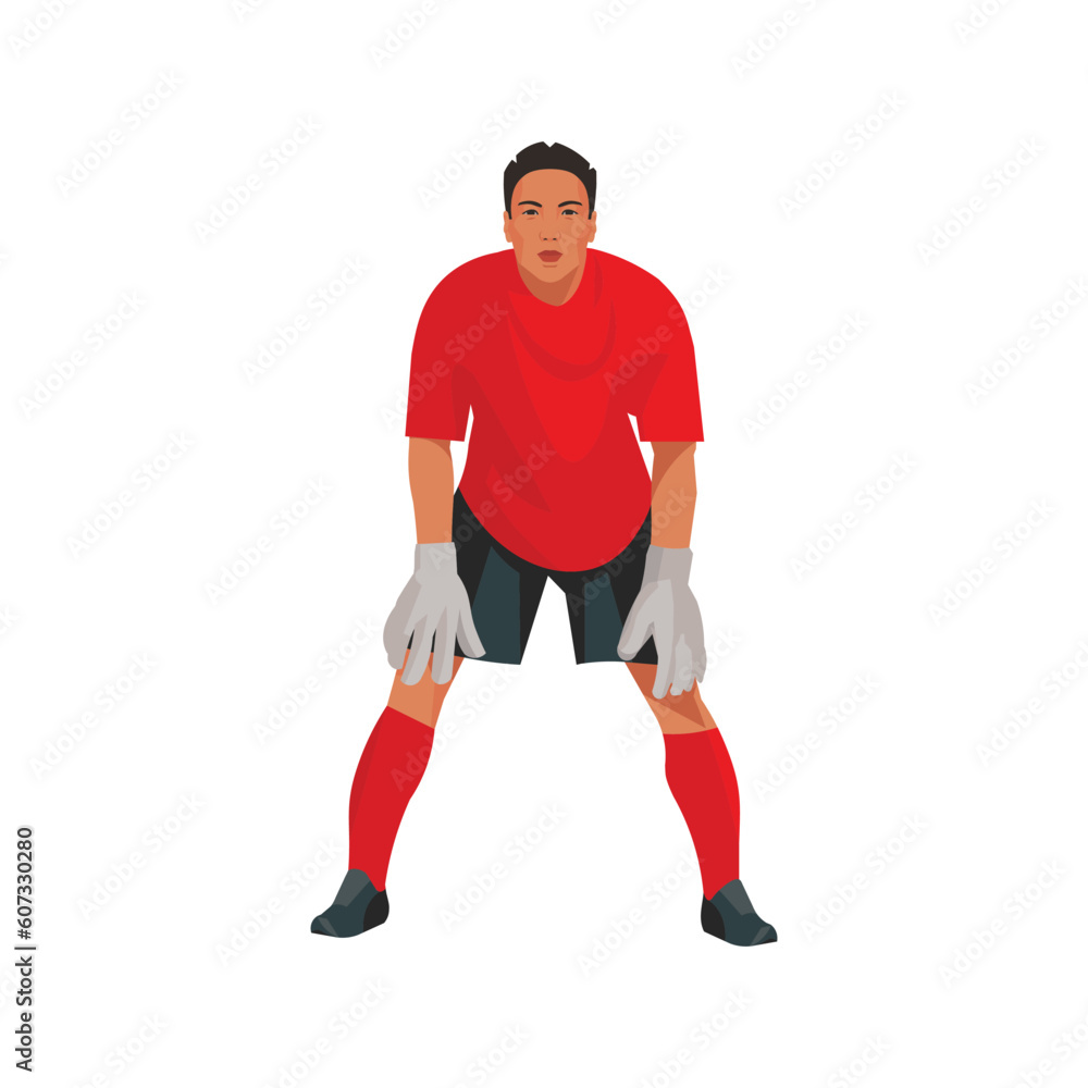 Japanese football goalkeeper in red equipment stands in goal and waits for the ball Japanese football goalkeeper in red equipment stands in goal and waits for the ball
