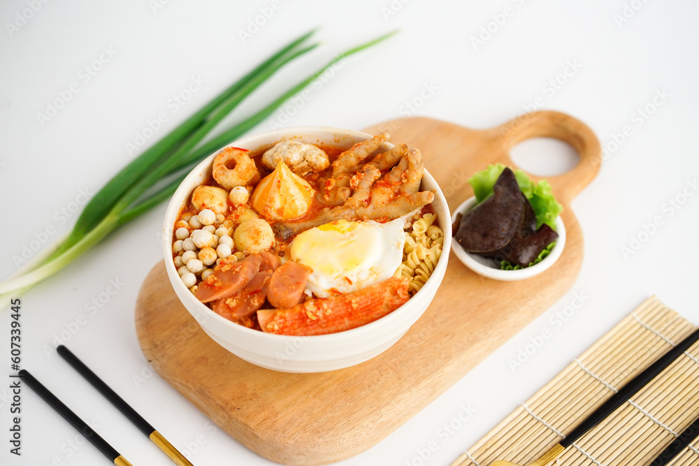 Seblak jeletot indonesia traditional food with any variant toping.