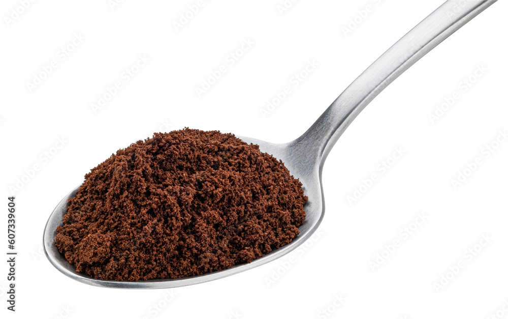 Ground coffee beans in spoon isolated on white background Ground coffee beans in spoon isolated on white background