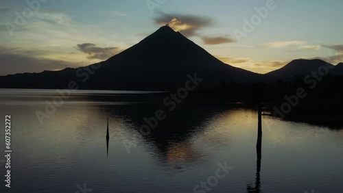 Silhouette of the Arenal Lake and Volcano in San Carlos, Alajuela, Costa Rica photo