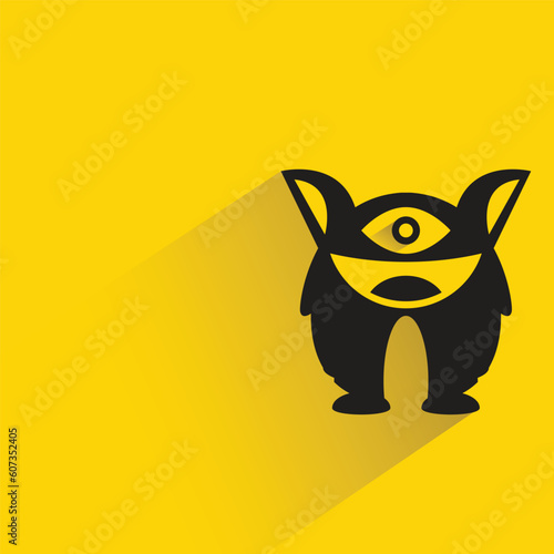 monster with shadow on yellow background