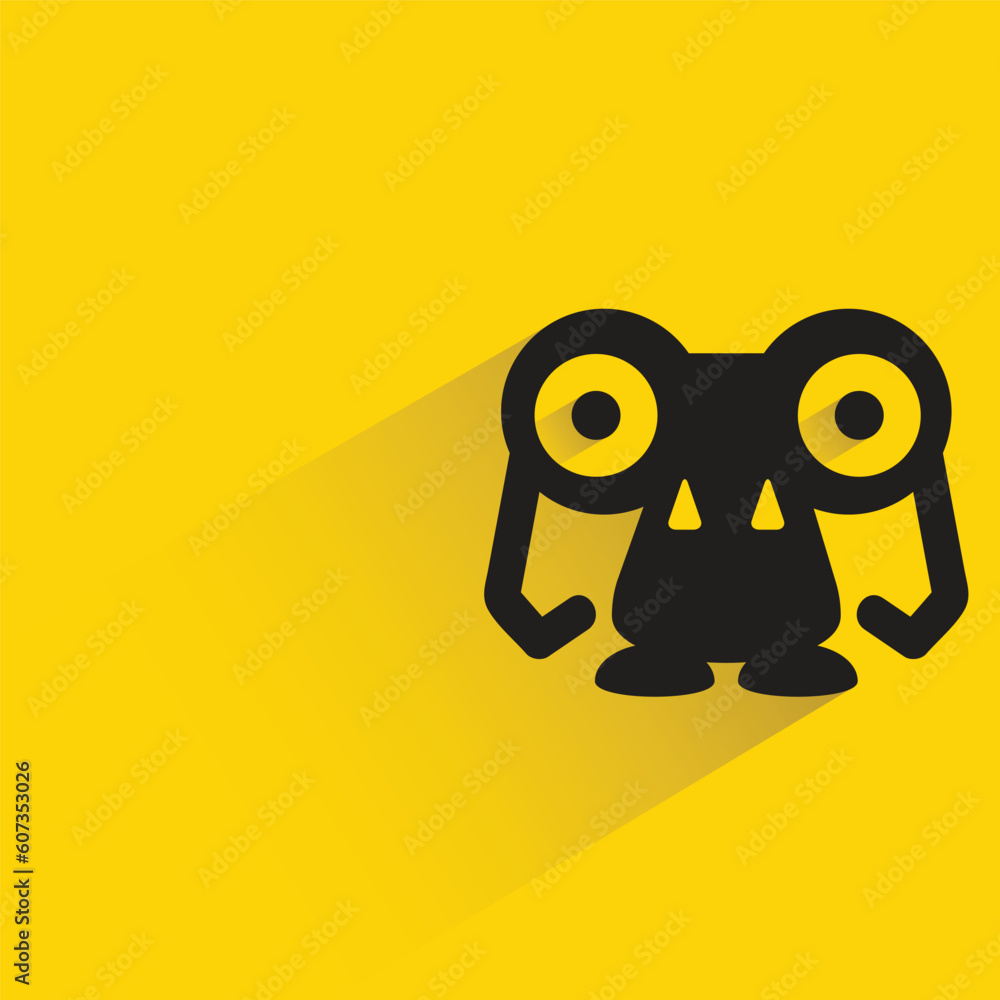Fototapeta premium alien monster with shadow on yellow background