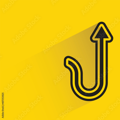 turb up arrow with shadow on yellow background