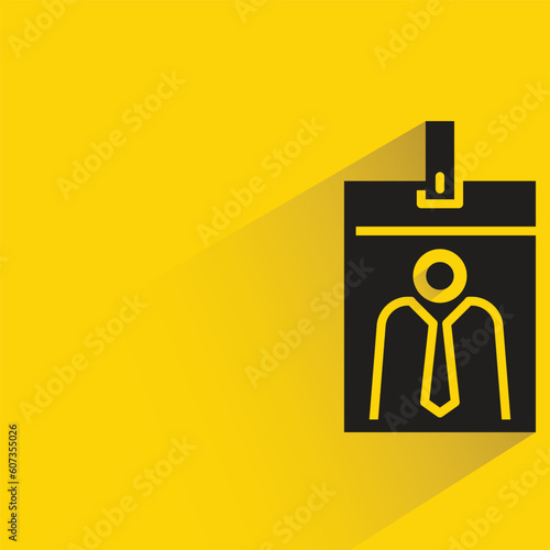 business card with shadow on yellow background