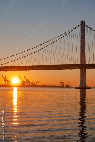 Beautiful shot of an orange sunset over Golden Gate Bridge