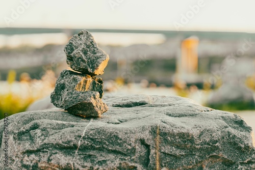 Closeup of stacked rocks in blurred background photo