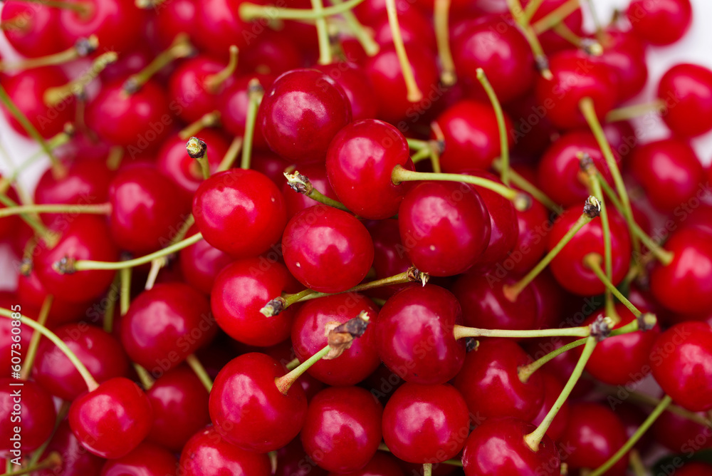 Background of red ripe juicy cherries, closeup, top view Background of red ripe juicy cherries, closeup, top view