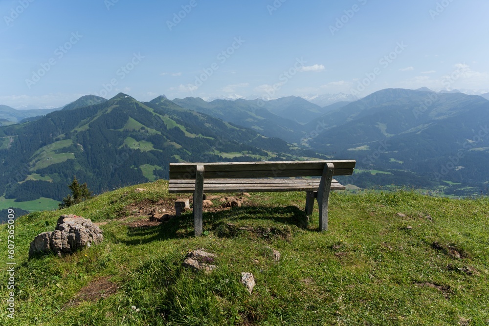 Beautiful view of a bench in the mountains in Austria Beautiful view of a bench in the mountains in Austria