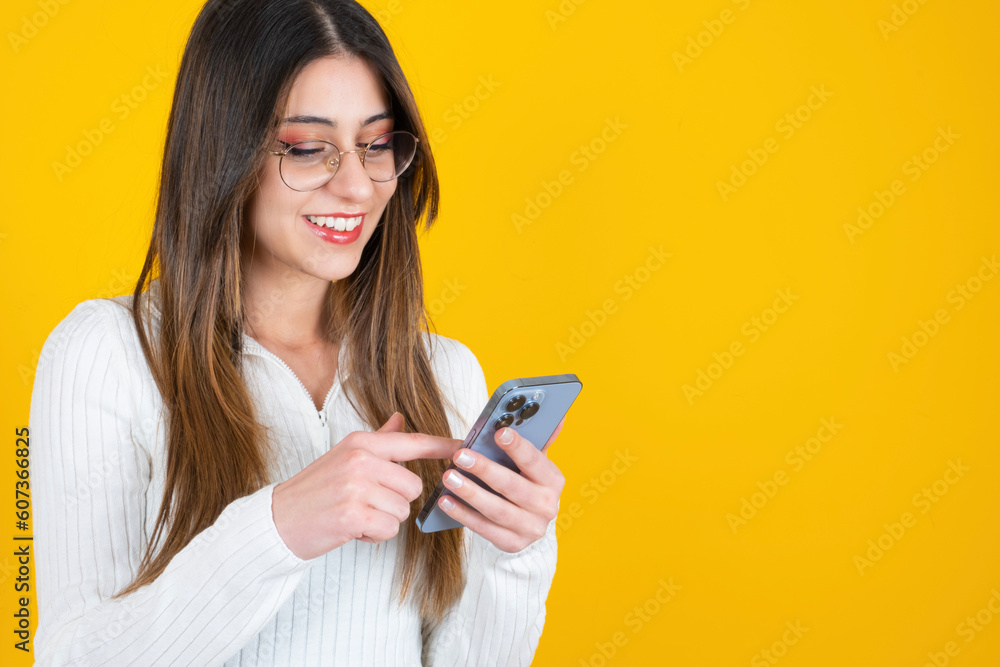 Using smartphone, close up photo portrait shot young smiling woman using smartphone. Chatting online, touching screen, browsing social media, messaging. Happy brunette girl modern lifestyle concept. Using smartphone, close up photo portrait shot young smiling woman using smartphone. Chatting online, touching screen, browsing social media, messaging. Happy brunette girl modern lifestyle concept.