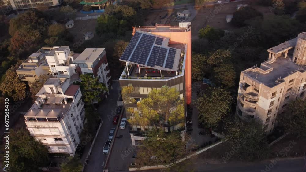 A commercial office building with Rooftop Solar Plant, Pune, Maharashtra, India A commercial office building with Rooftop Solar Plant, Pune, Maharashtra, India