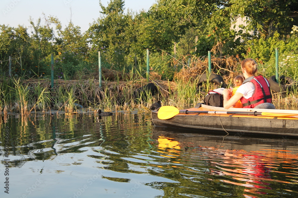Sundown Kayaking: Active River Adventure amidst Glowing Sunset, Embracing Outdoor Thrills and Tranquil Retreat