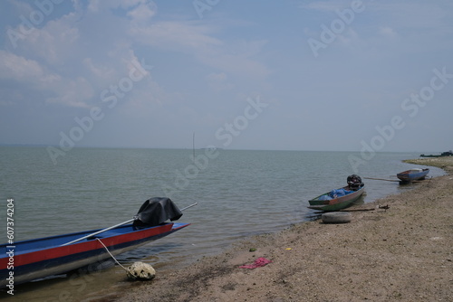The boat is moored on the river of the fishermen. at Pa Sak Dam, Lop Buri