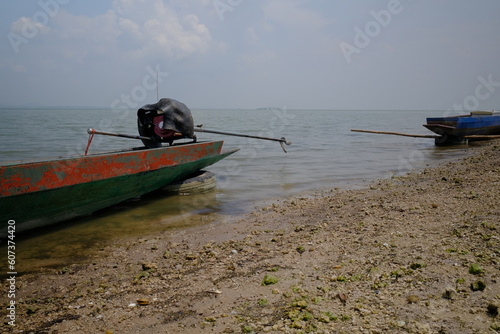 The boat is moored on the river of the fishermen. at Pa Sak Dam, Lop Buri