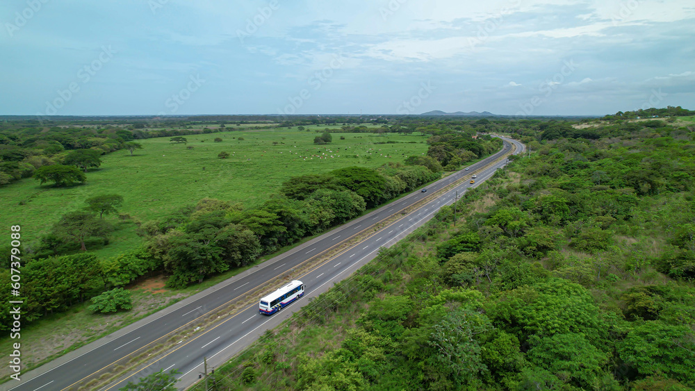 AERIAL: Scenic view of Panam Highway leading through tropical Panama countryside