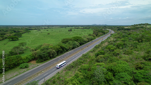AERIAL: Scenic view of Panam Highway leading through tropical Panama countryside