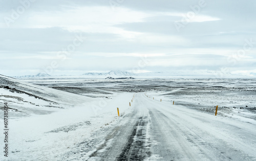 Winter snow road in Iceland with mountains © Matúš Astrab