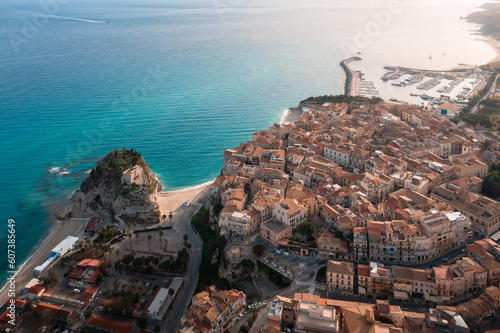 Tropea town, harbor and castle, early morning aerial view