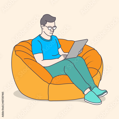 Young boy working on a bean bag chair with a laptop using from home, flat coloring line art minimal illustration