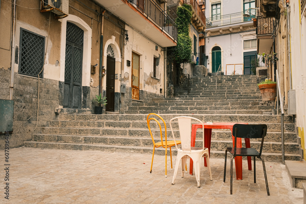 Quaint alley with stairway in Aci Trezza, Catania. Italy