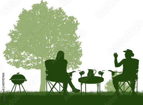 Barbeque in the garden, family spends their free time.	