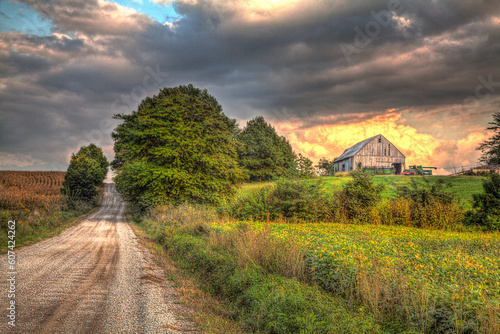 Barn under a stunning cloud along a gravel road in rural Missouri  © Larry 