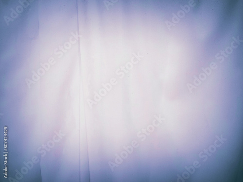 centered flare light on a smooth cotton soft fabric background