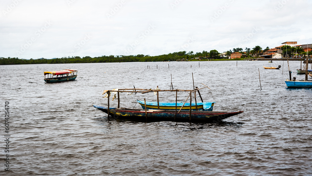 View of fishing boats moored on the Rio das Almas in the city of Taperoa, Bahia.