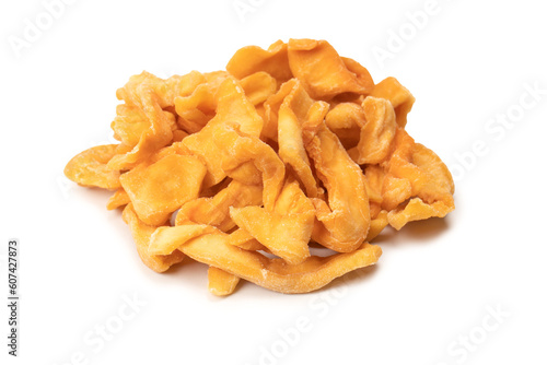 Dried melon slices isolated on a white background.