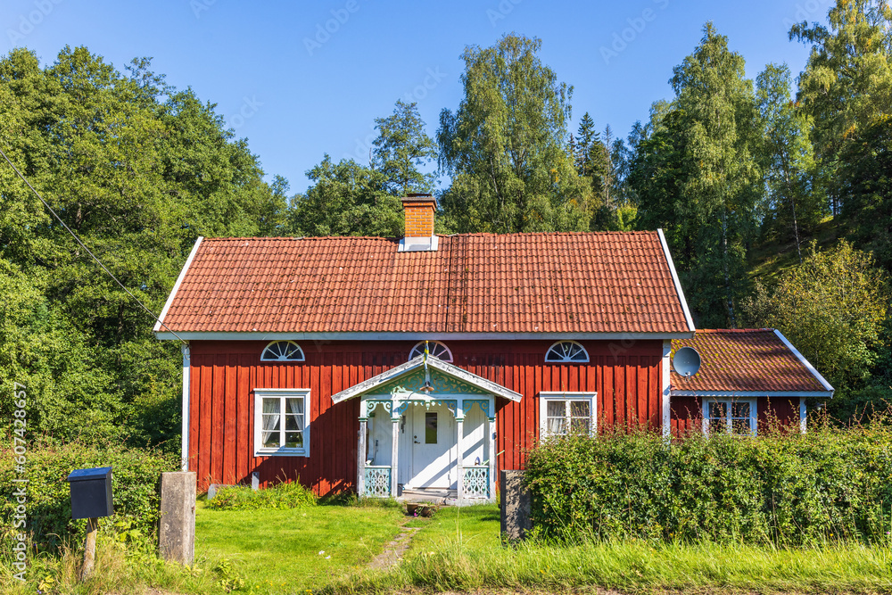 Idyllic little red cottage in the countryside