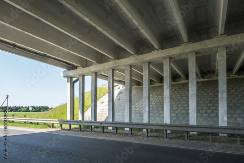 concrete columns like pillars of an automobile bridge © hiv360