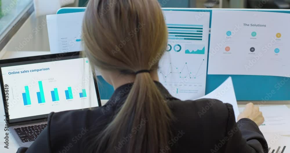 Business woman entrepreneur making data analysis on success plan ...