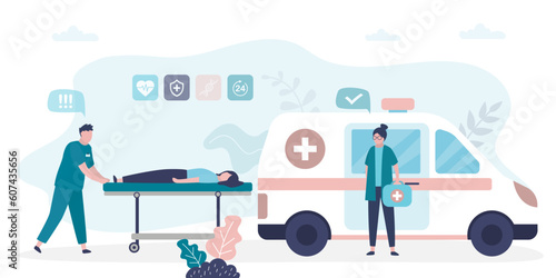 Ambulance concept. Emergency doctor in uniform performing first aid. Paramedics provide first aid to injured person on medical stretcher for emergency care.