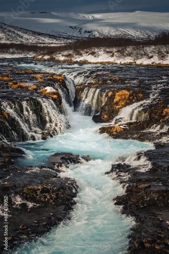 Bruarfoss waterfall and its surroundings captured on a winter afternoon in Iceland.