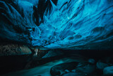 Ice Cave in Vatnajokull Glacier in Iceland - amazing colors create an unearthly atmosphere.
