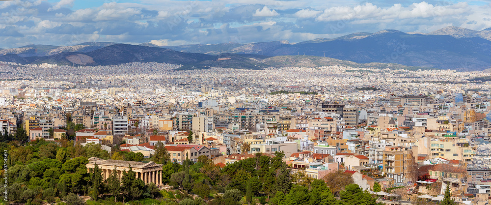 Skyline of Athens city, landscape with ruins of Temple of Hephaestus as seen from Areopagus hill. Scenic panoramic view of remains of ancient Athens, capital of Greece