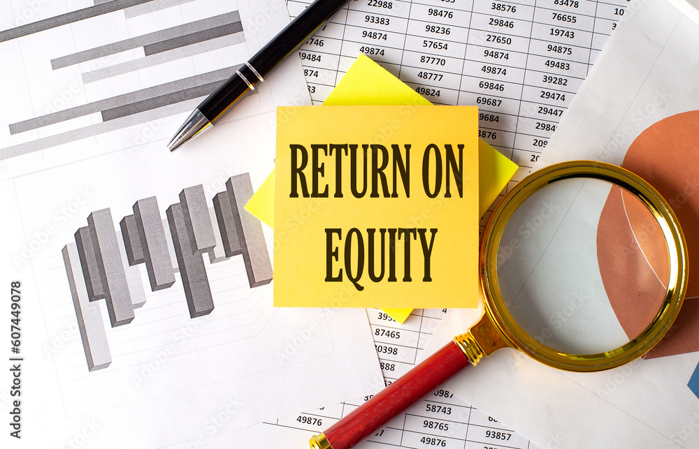 RETURN ON EQUITY text on a sticky on the graph background with pen and magnifier RETURN ON EQUITY text on a sticky on the graph background with pen and magnifier