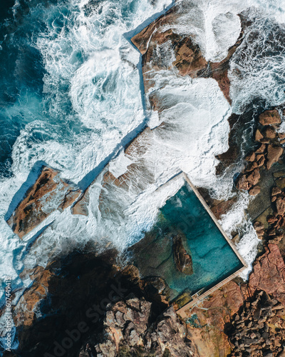 Canvas Print North Curl Curl rock pool with incoming waves.